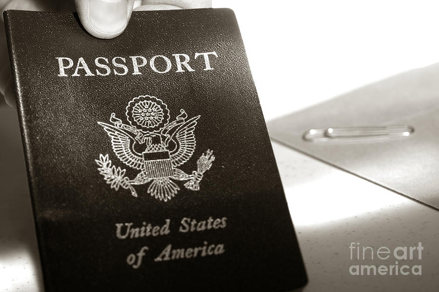 American Passport in Traveler Hand Photograph by Olivier Le Queinec