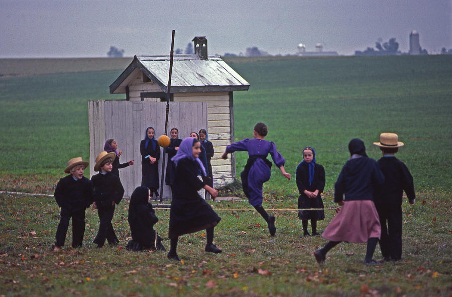 Amish Lifestyle Photograph - Amish Children Play High Water At School by Bl...