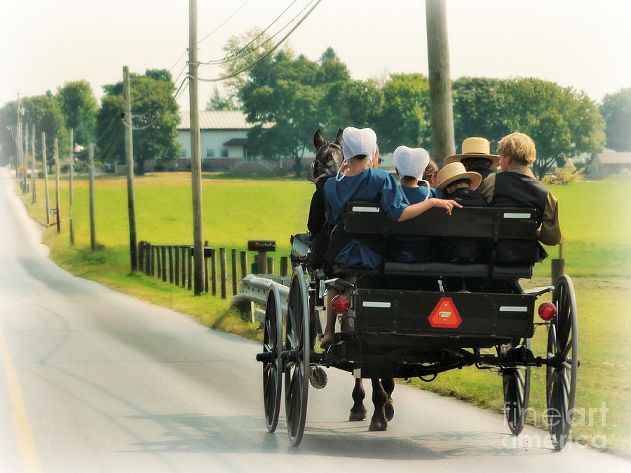 Amish Family Travelling With Horse And Buggy Photograph by Beth Ferris Sale