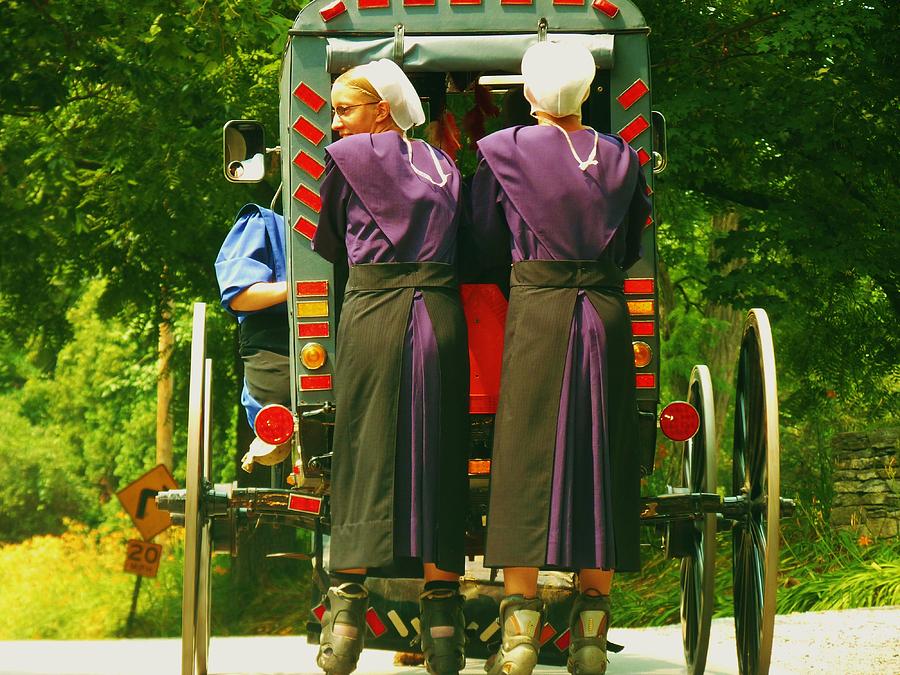 Amish Girls on Roller Blades Photograph by Jeanette Oberholtzer