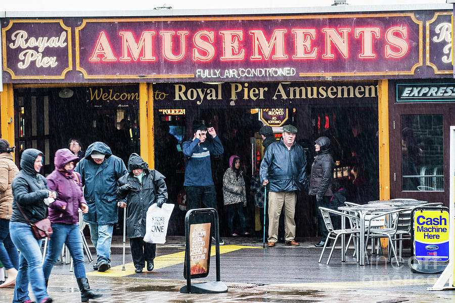 Holiday Photograph - Amusement arcade in the Rain by Keith Morris