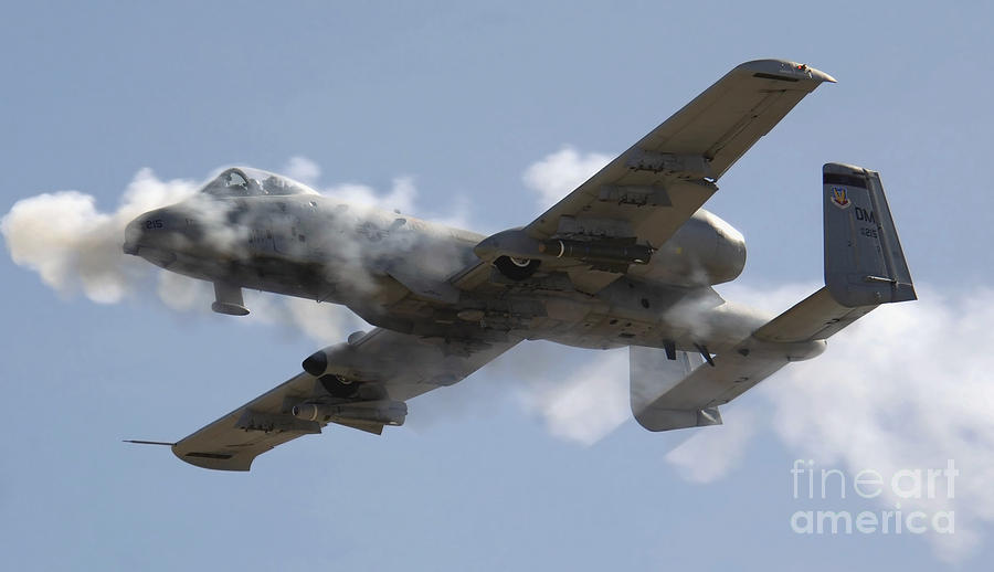 An A-10 Thunderbolt II Fires Its 30mm Photograph by Stocktrek Images