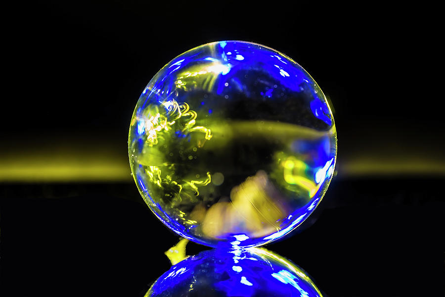 An abstract blue and yellow glass ball image Photograph by Sven Brogren