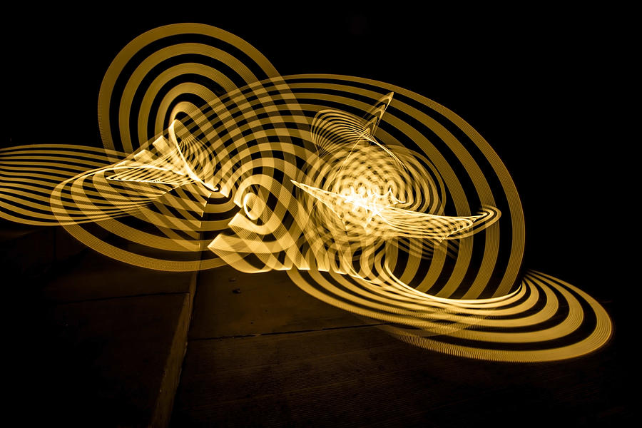 AN abstract yellow ribbon of painted light Photograph by Sven Brogren