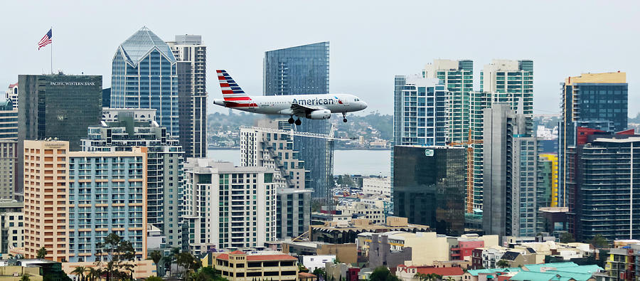 Transportation Photograph - An American Jet on Approach Over Downtown San Diego, CA, USA by Derrick Neill