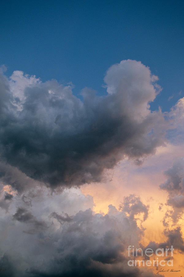 An Angel Shaped Cloud Photograph by John Harmon