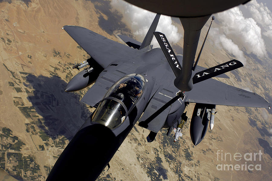 Airplane Photograph - An F-15 Strike Eagle Prepares by Stocktrek Images