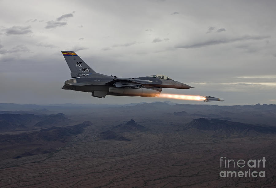 An F-16 Fighting Falcon Fires An Agm-65 Photograph by HIGH-G Productions