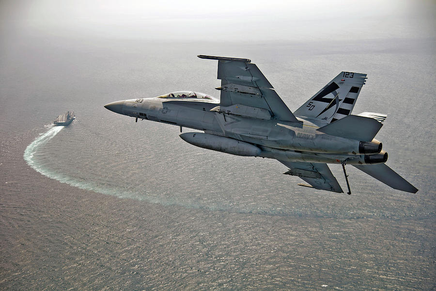 Transportation Painting - An F A-18F Super Hornet flies over USS Gerald R. Ford 2 by Celestial Images