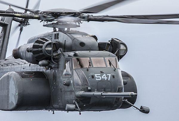 An MH-53E Sea Dragon helicopter conducts an aerial refuel Painting by ...