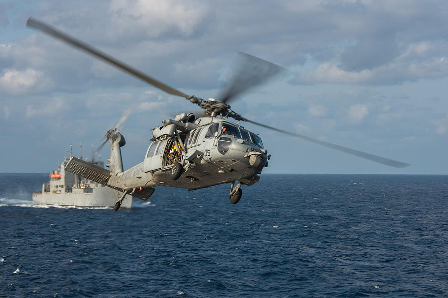 Sports Photograph - An MH-60S Sea Hawk helicopter by Celestial Images