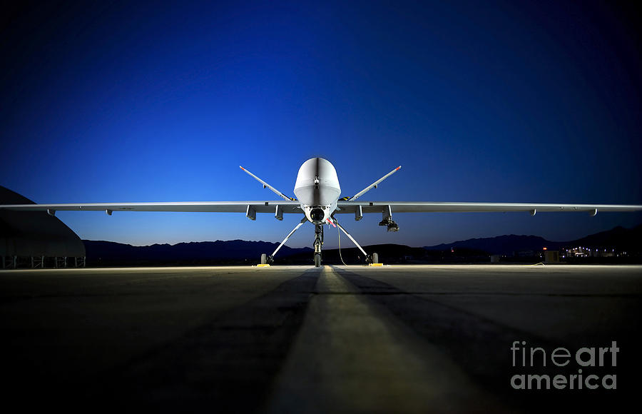 Airplane Photograph - An Mq-9 Reaper Sits On The Flightline by Stocktrek Images