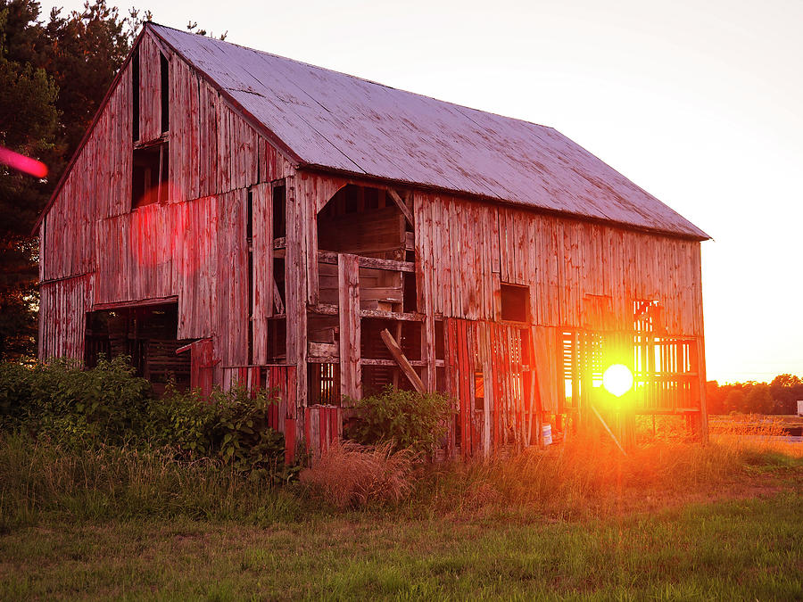 An old barn glow Photograph by Shawn M Greener