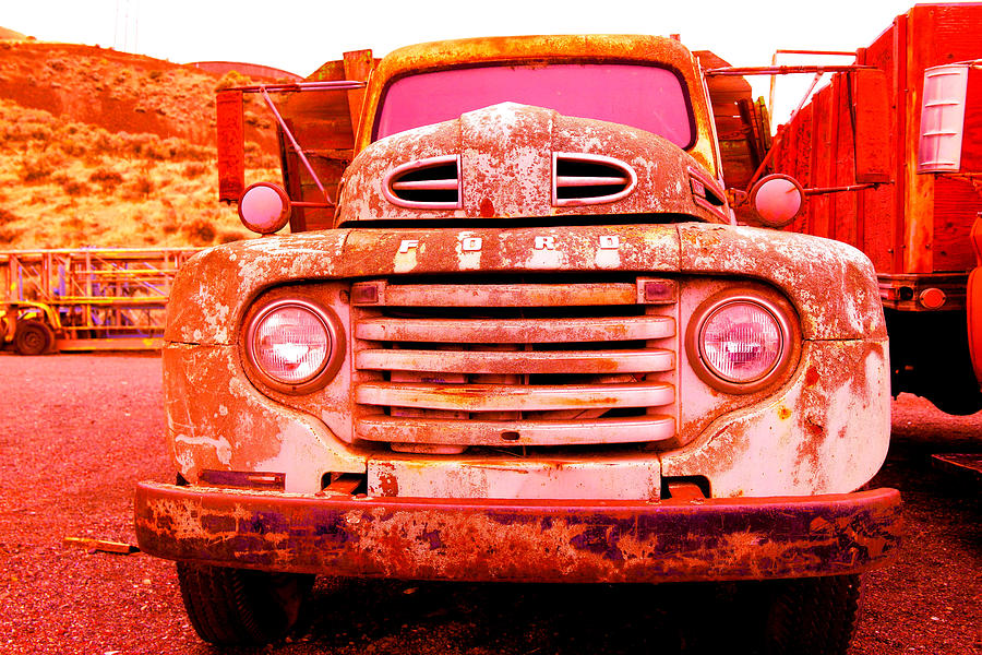 An old rusty truck Photograph by Jeff Swan