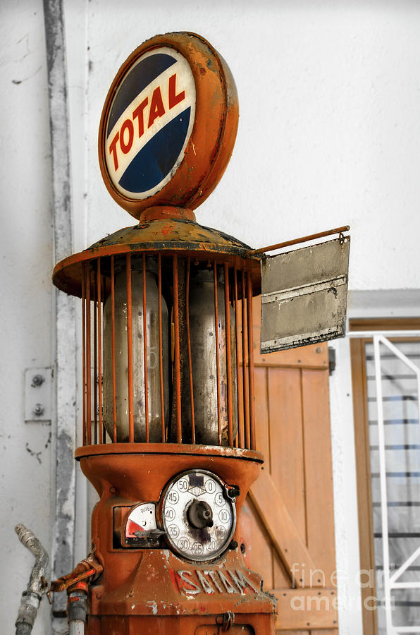 An old Satam petrol pump in Savensa Photograph by RicardMN Photography