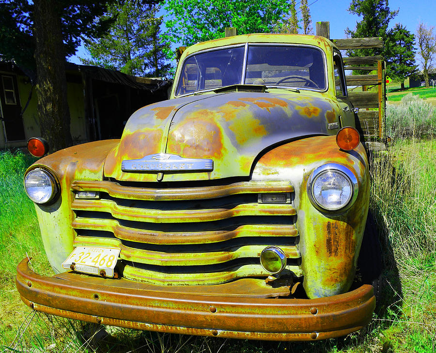 An old truck on the farm Photograph by Jeff Swan