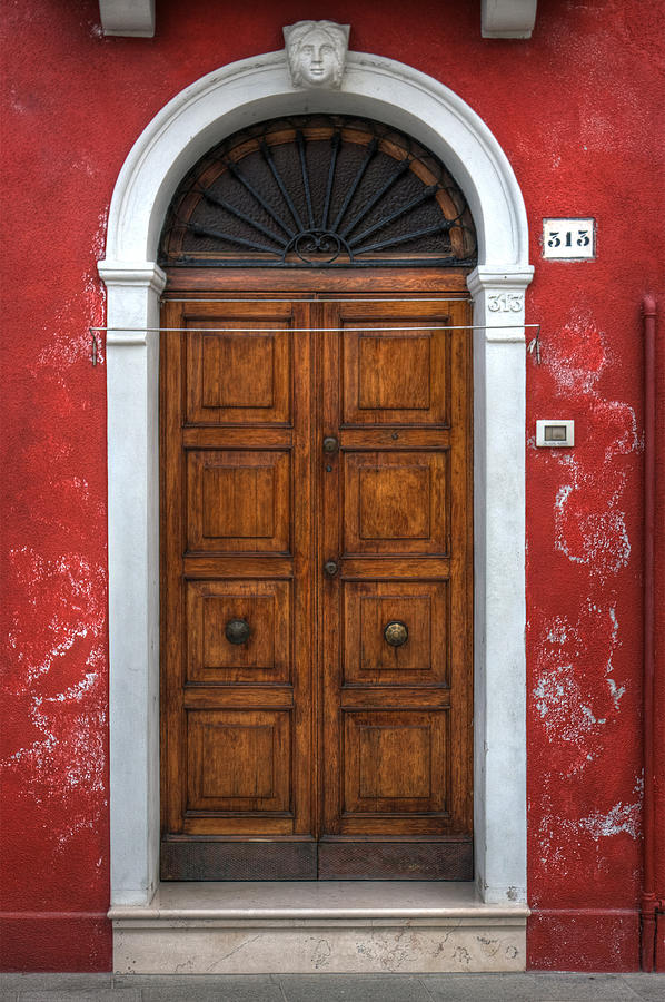 an old wooden door in Italy Photograph by Joana Kruse