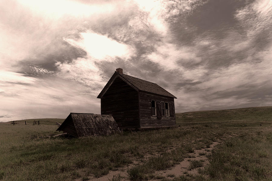 An old wooden house near Alexander North Dakota Photograph by Jeff Swan