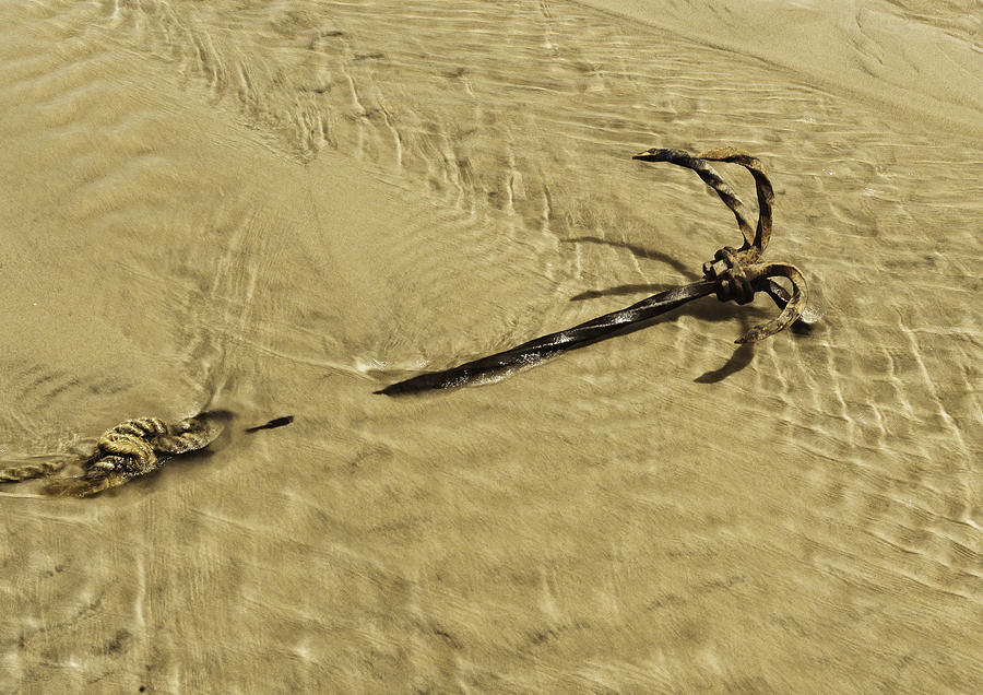 Anchor on sandy beach Photograph by Patrick Kain