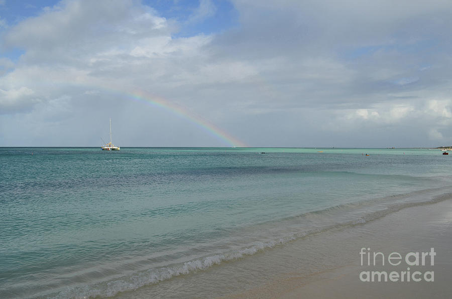 Anchored Catamaran With a Rainbow in the Sky Photograph by DejaVu Designs