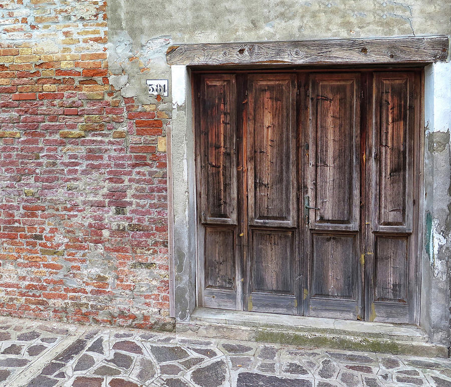 Ancient Wooden Door in Burano Photograph by Dave Mills