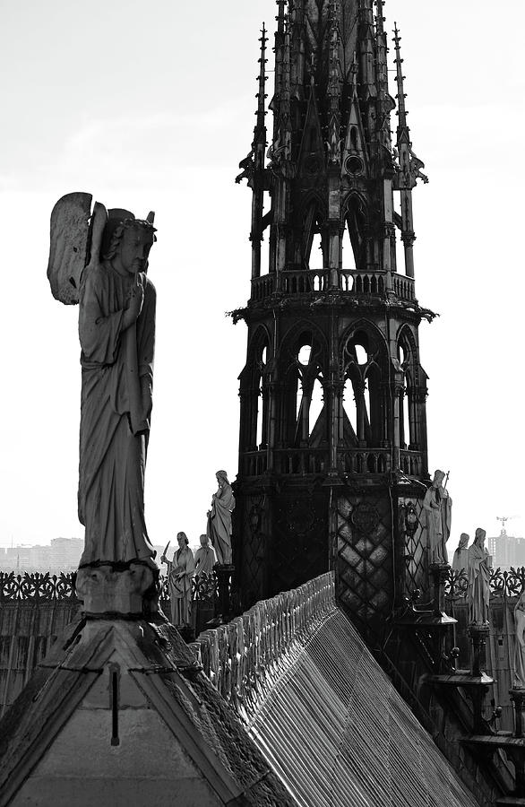 Angel atop Notre Dame de Paris Cathedral with Gothic Steeple Background Black and White Photograph by Shawn OBrien