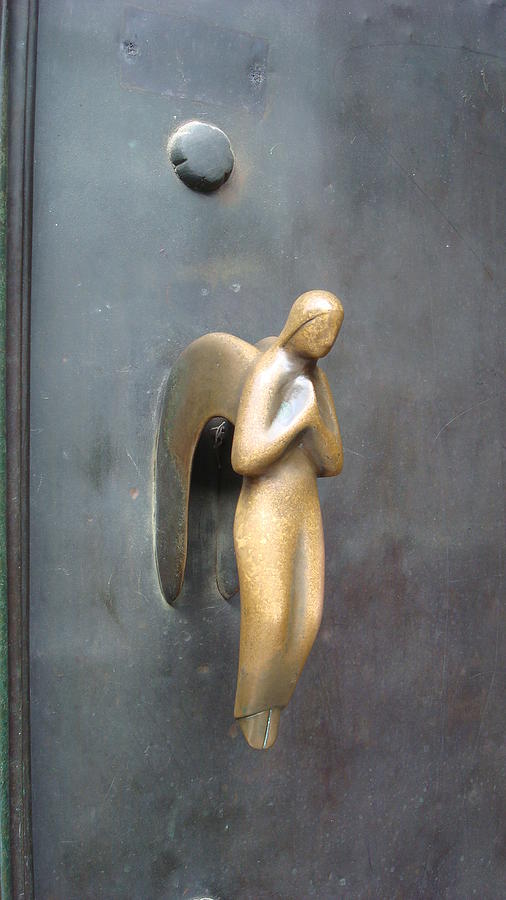 Angel  Door Handle Photograph by Yuri Tomashevi