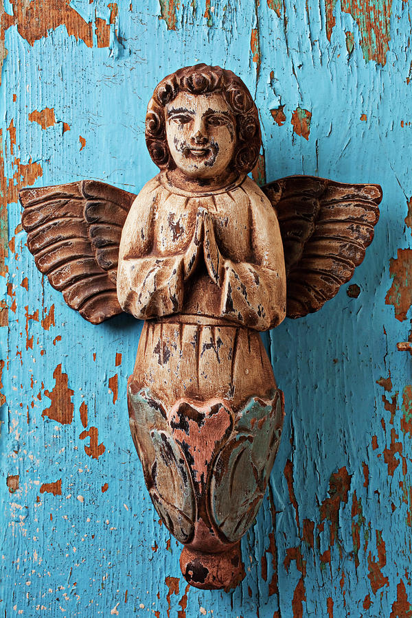 Still Life Photograph - Angel on blue wooden wall by Garry Gay