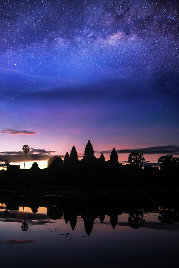 Angkor wat temple with morning sunrise and star  Photograph by Anek Suwannaphoom