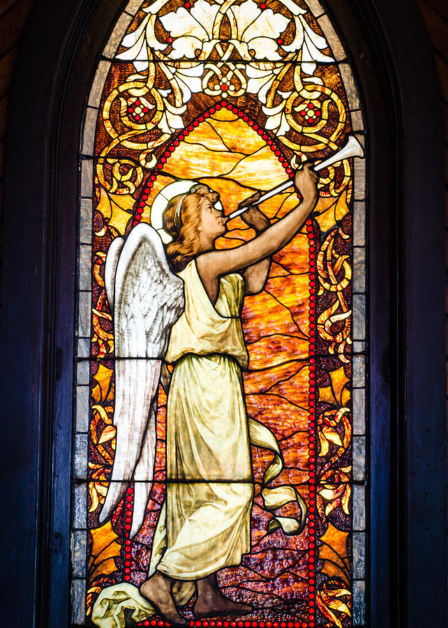 Angel in glass Photograph by Tom Potter