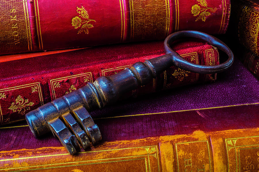 Antique Books And Key Photograph by Garry Gay
