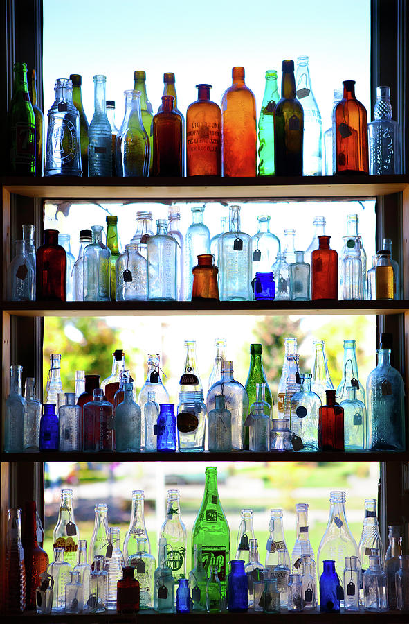 Antique Bottle Window Display Photograph by Marilyn Hunt