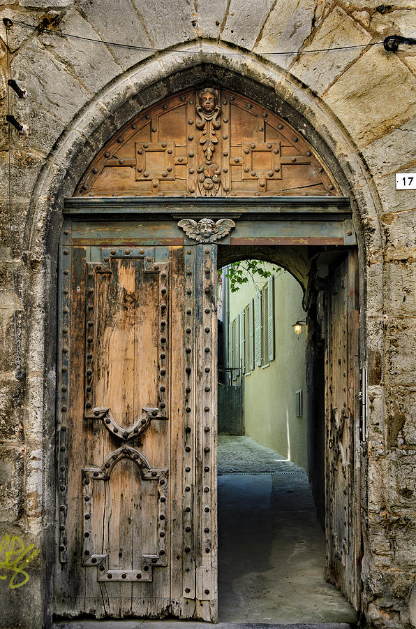 Antique carved door in Cahors Photograph by RicardMN Photography