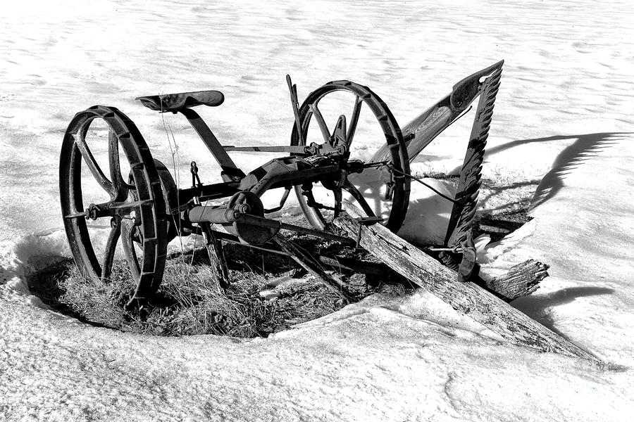 Winter Photograph - Antique Farm Machine in Winter Snow by Olivier Le Queinec