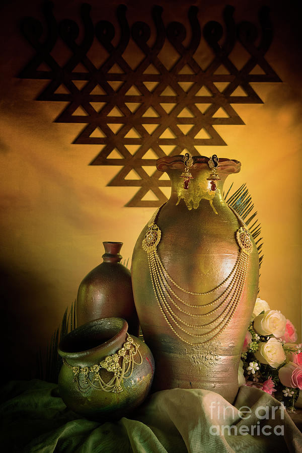 Antique jewelry set mounted on pot Photograph by Kiran Joshi