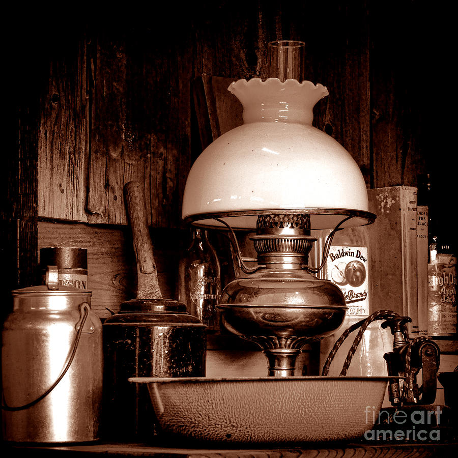 Vintage Photograph - Antique Kerosene Lamp in a Kitchen by Olivier Le Queinec