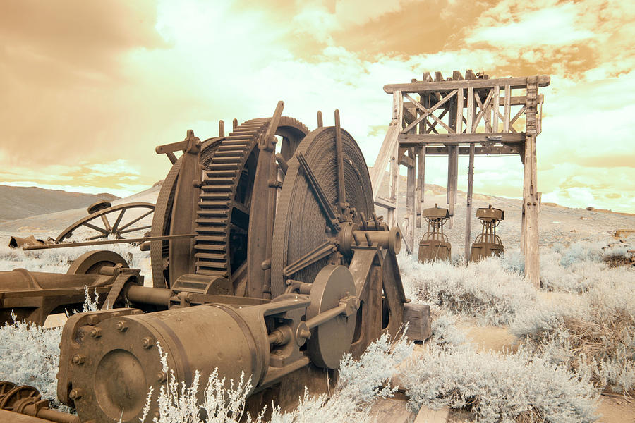 Antique mining equipment in Bodie, California in infrared Photograph by Karen Foley