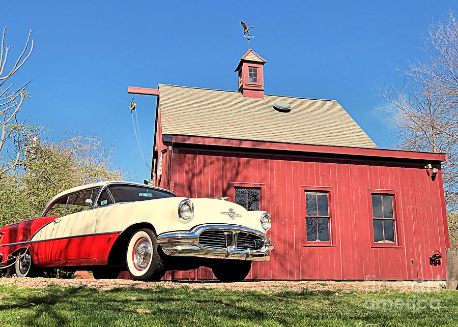 Antique Oldsmobile  Photograph by Janice Drew