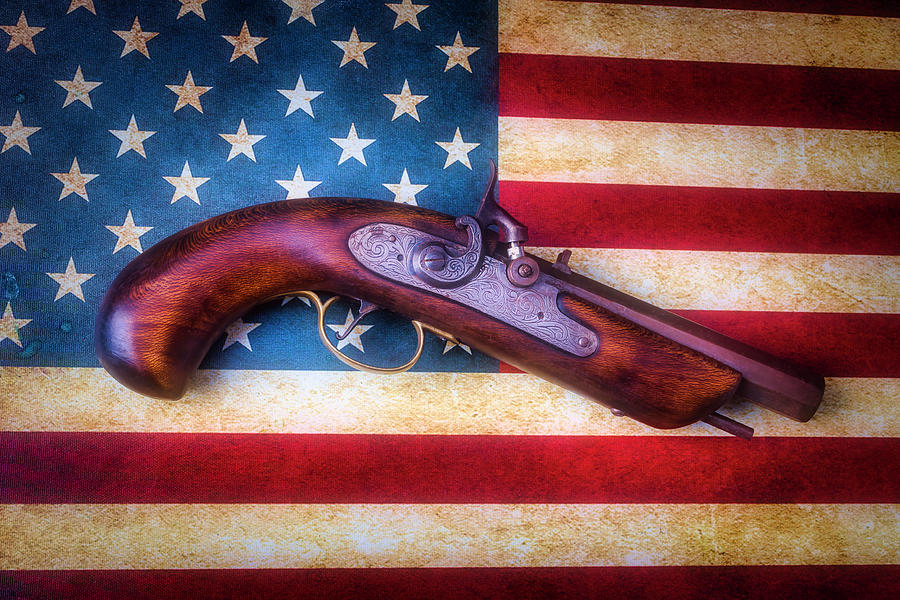 Antique Pistole On American Flag Photograph by Garry Gay