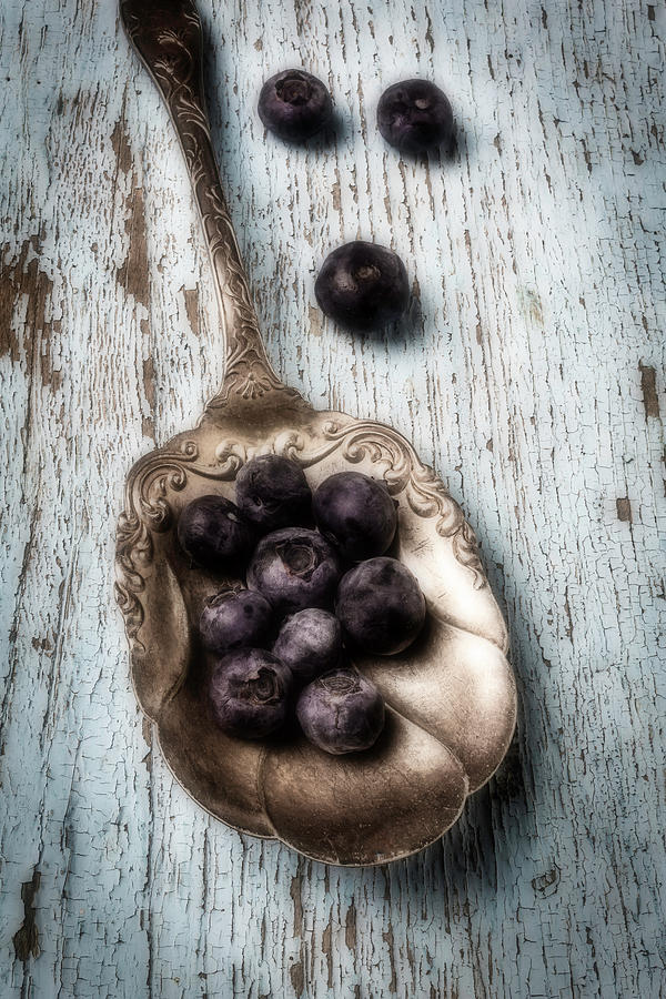 Antique Spoon And Buleberries Photograph by Garry Gay