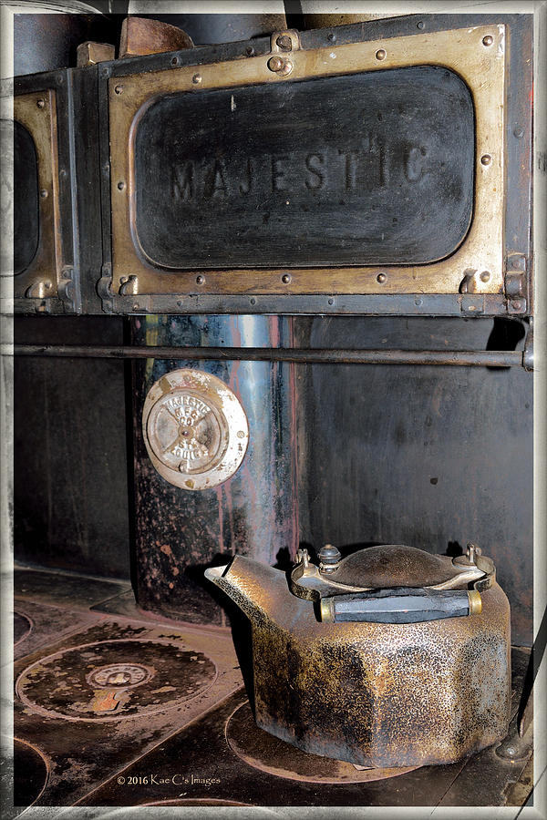 Antique Stove and Kettle Photograph by Kae Cheatham