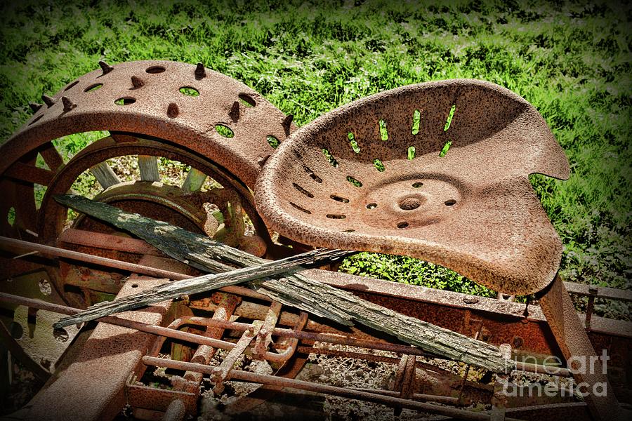 Antique Tractor Seat  Photograph by Paul Ward