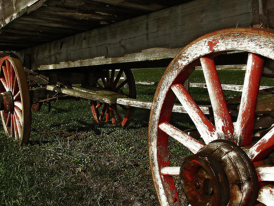 Antique Wagon Wheels Photograph by Scott Hovind