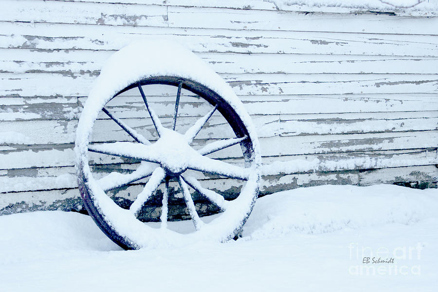 Antique Wheel in the Snow Photograph by E B Schmidt