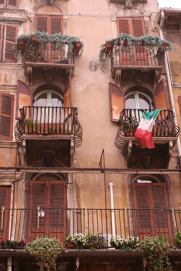 Apartments overlooking the streets of Verona Photograph by Greg Sharpe