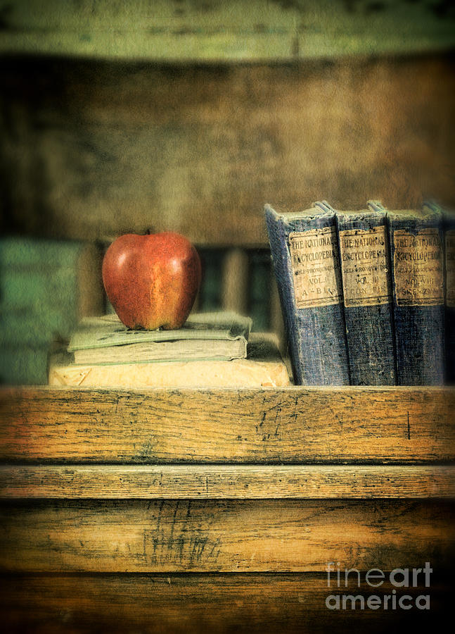 Apple and Books on the Teachers Desk Photograph by Jill Battaglia