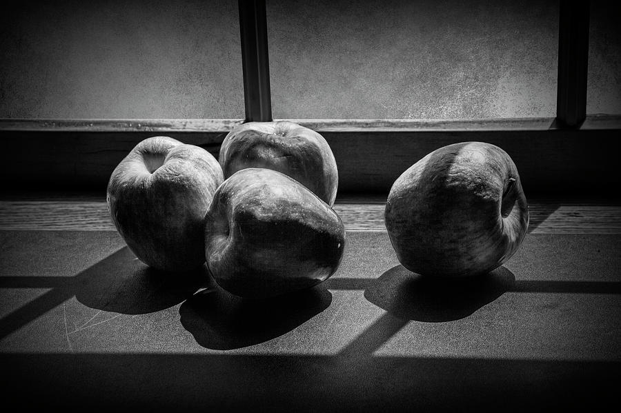 Apples in the Sun Light by the Window in Black and White Photograph by Randall Nyhof