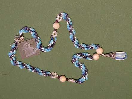 Garnets Jewelry - Aqua and purple woven necklace by Susan Anderson Garnets Jewelry - Aqua and purple woven necklace by Susan Anderson