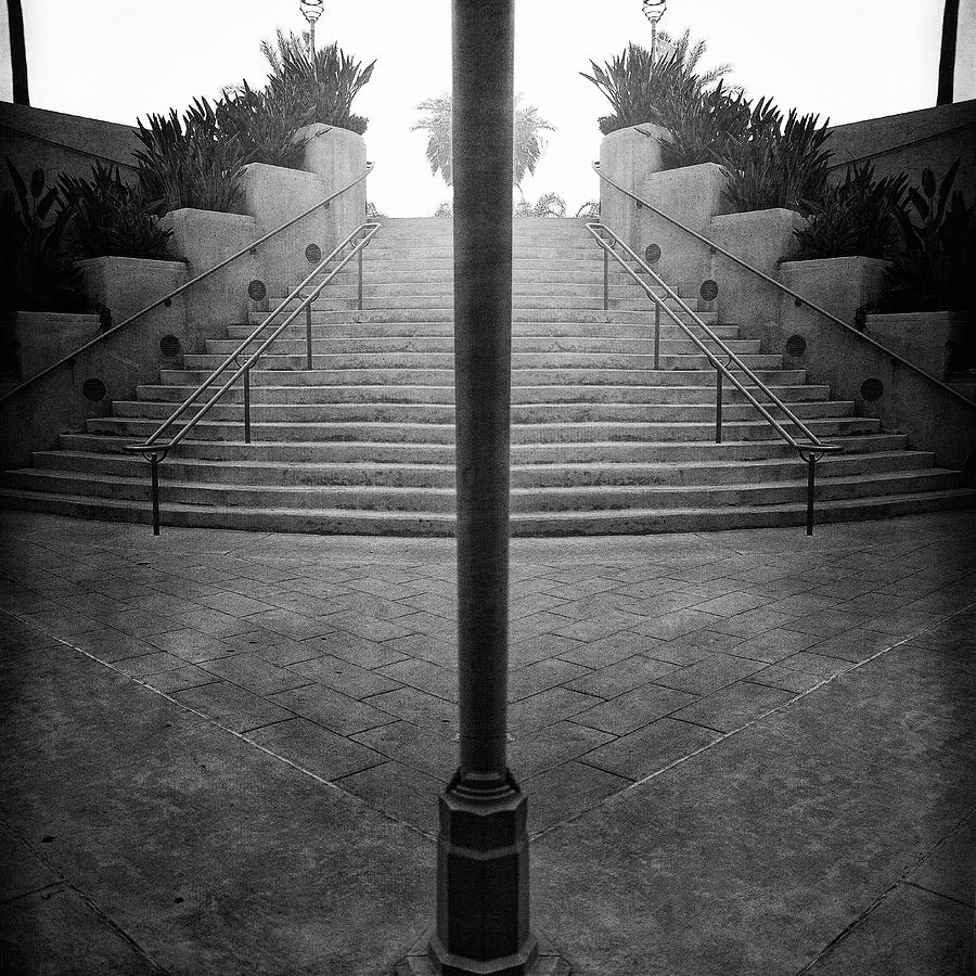 Black And White Photograph - Arch Steps and Light Pole from Parking Structure by YoPedro