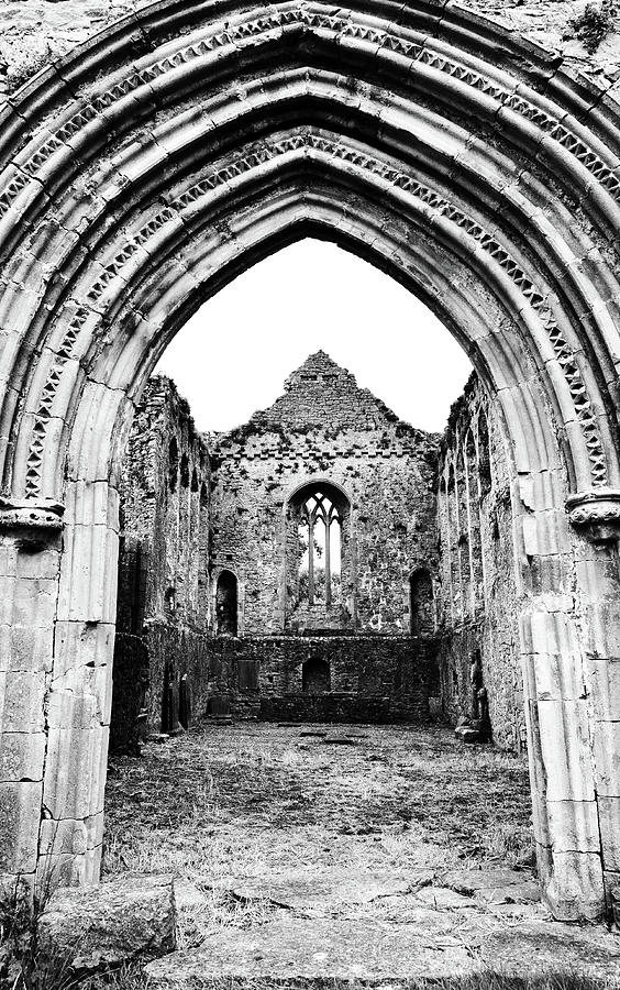 Athassel Priory Tipperary Ireland Medieval Ruins Decorative Arched Doorway into Great Hall BW Photograph by Shawn OBrien